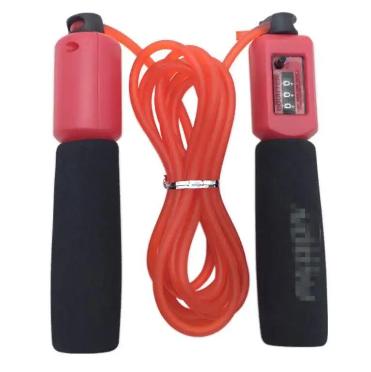 Rope skipping fitness rope with red handles and orange PVC rope, 3m length, made from PS, PP, sponge.