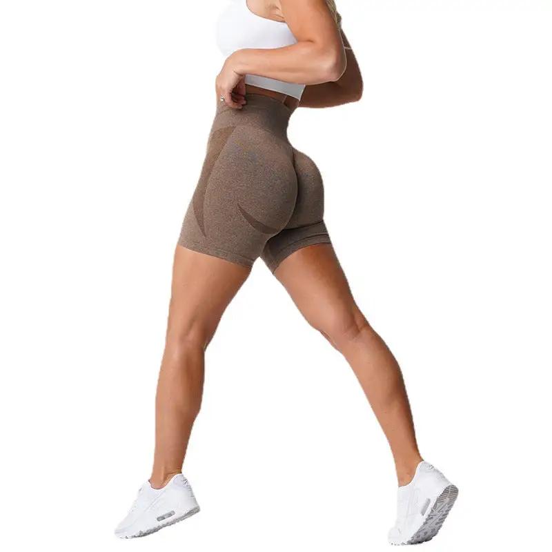 Women's yoga shorts fitness pants in brown, designed for sports activities like yoga, running, and cycling. Made of a spandex and nylon chemical fiber blend.