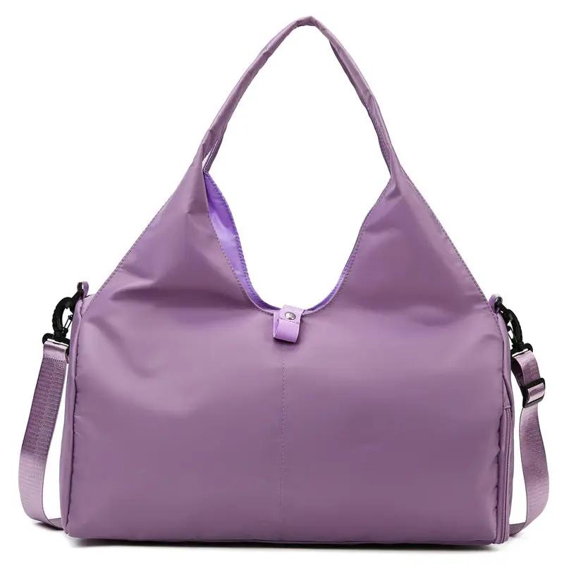 Women yoga bag with wet separation, large capacity, and yoga mat holder in purple.