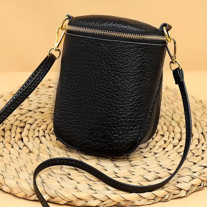 WILKYs4High-quality Leather Mobile Phone Bag Korean Style Shell Bags For Wome
 Product information:
 


 Color:black,beige
 
 Material: head layer cowhide
 
 Function:shoulder/crossbody
 
 Lining:polyester
 
 Shoulder strap: 120cm adjustable 