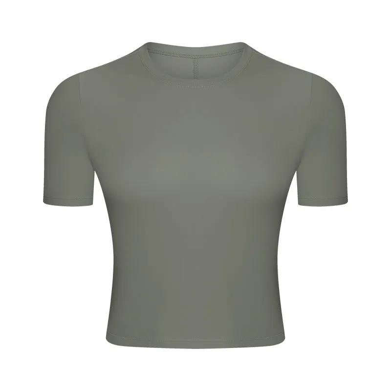 WILKYs0Elastic Breathable Fitness Yoga Wear
 Product information:
 
 Product category: T-shirt
 
 Function: Super flexible
 
 Fabric: Nylon
 
 Color: White, salt water blue, green gray, coral powder, pearl ye
