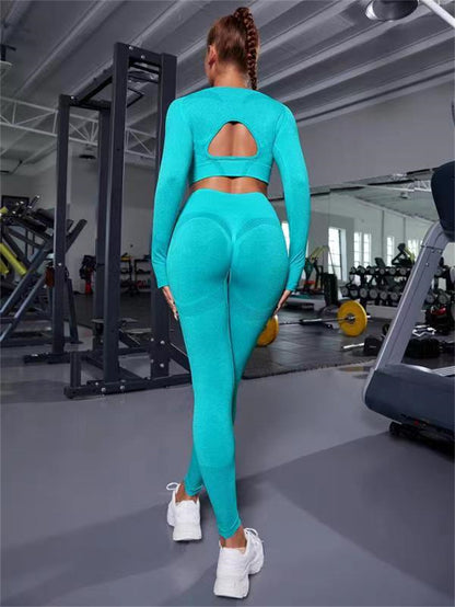 WILKYsSweat Suit2pcs Sports Suits Long Sleeve Hollow Design Tops And Butt Lifting HighThe 2 pcs sportss suit perfect for any workout.  The suit is made of high-quality, moisture-wicking fabric that keeps you cool and dry. The elastic waistband ensures