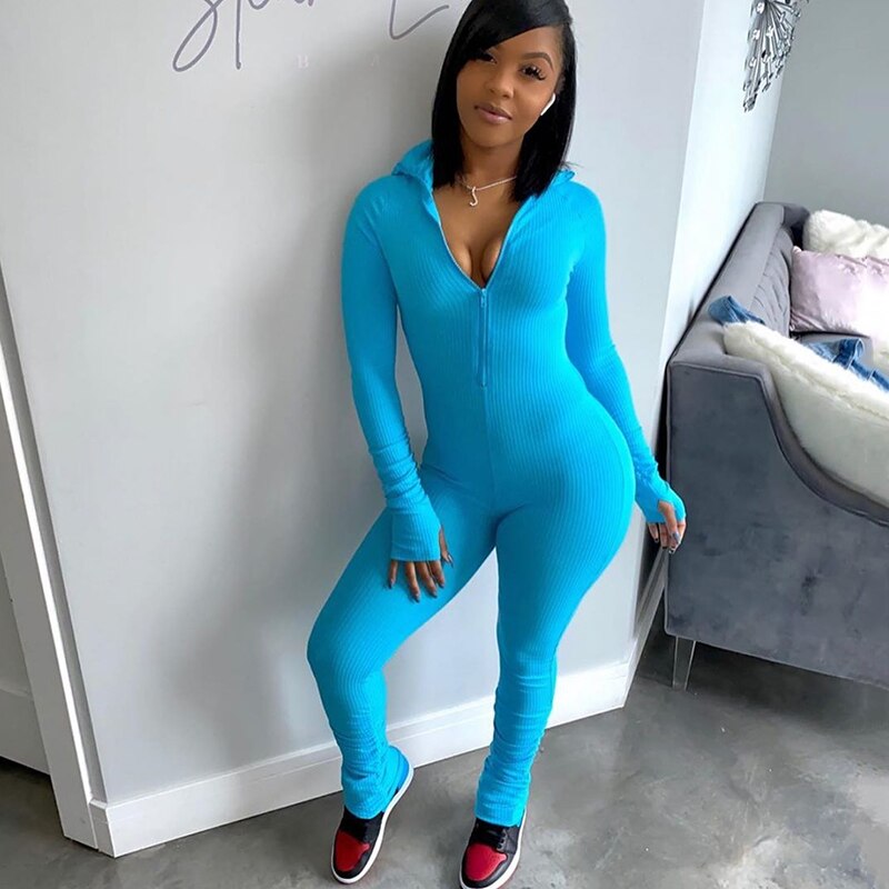 Turtleneck gloved sleeve jumpsuit leggings in blue, stylish and cozy winter fashion.